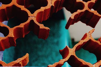 Close-up of broken patterned railing