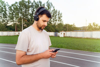 Young man using mobile phone