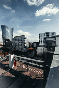 Modern cityscape against sky