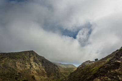 Low angle view of mountains against sky