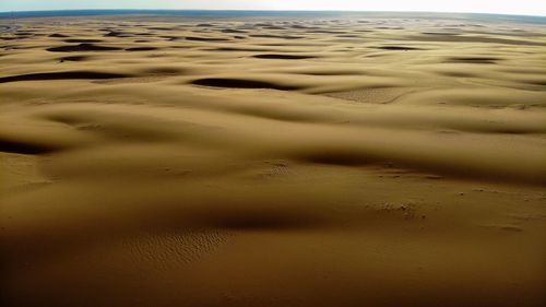 High angle view of sand dune on beach
