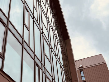 Low angle view of modern building against sky