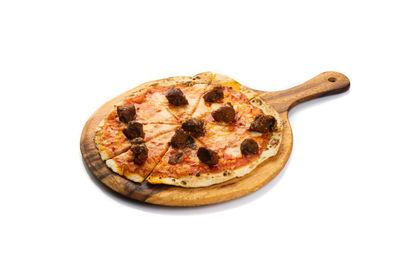 Directly above shot of pizza against white background