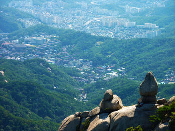 Woman looking at cityscape