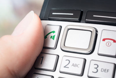 Close-up of person using mobile phone