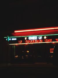 View of illuminated sign at night