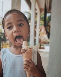 Portrait of cute boy holding ice cream