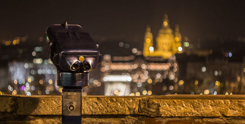 Coin-operated binoculars at night