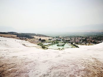 Panoramic view of city buildings against clear sky