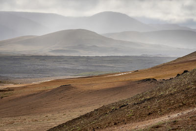 View of mist covered landscape at namafjall