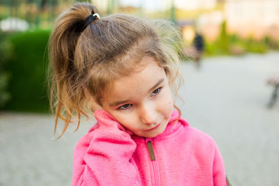 Close-up of girl looking away