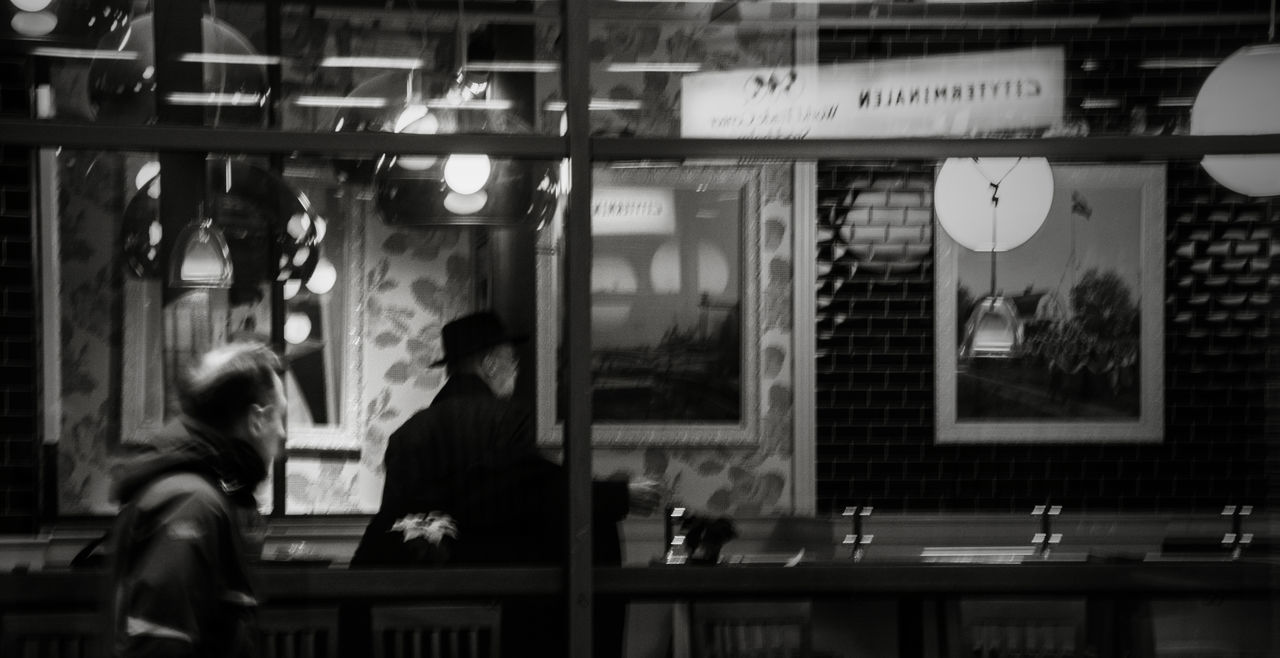 PEOPLE IN RESTAURANT AT NIGHT