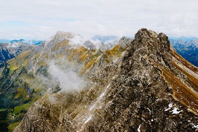 Scenic view of mountain range against sky