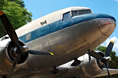 Airplane against sky