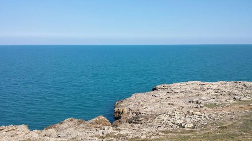 Scenic view of sea against clear sky