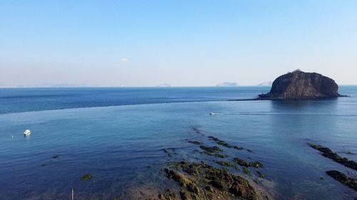 Scenic view of sea against clear sky