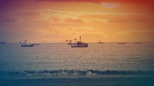 Scenic view of sea at sunset