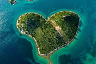 High angle view of heart shape on beach