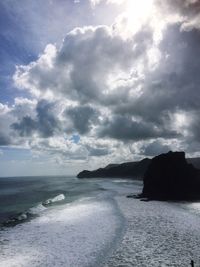 Scenic view of sea against cloudy sky