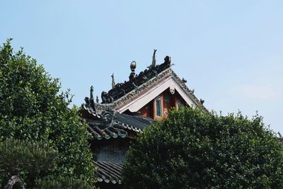 Low angle view of traditional building against sky
