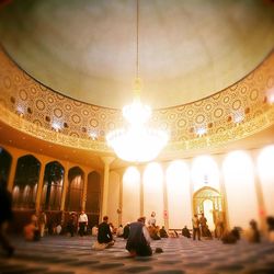 Low angle view of illuminated ceiling