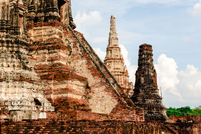 Low angle view of old building in ayutthaya province under the blue sky