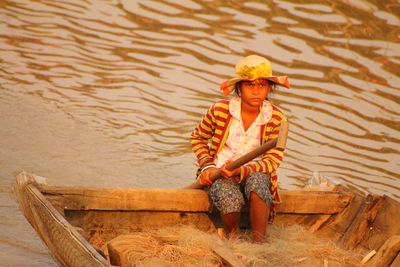 Woman sitting outdoors