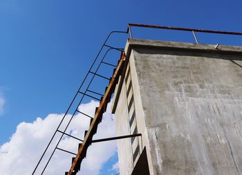 Low angle view of building against blue sky