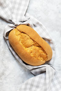 High angle view of bread on paper