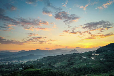 Scenic view of landscape against sky during sunset