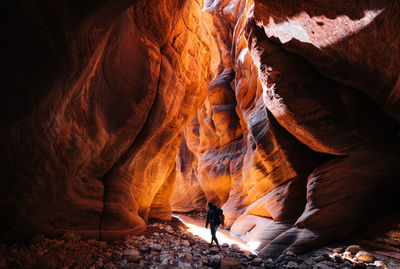 Person walking in cave