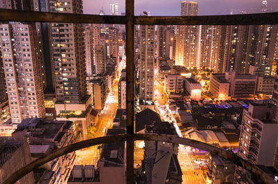 High angle view of illuminated city at night