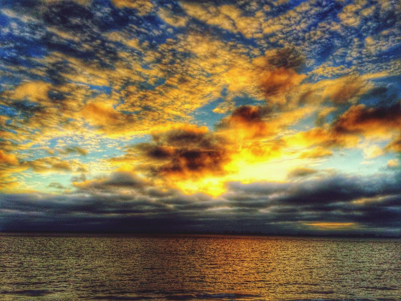 sea, sunset, sky, water, scenics, horizon over water, tranquil scene, beauty in nature, tranquility, cloud - sky, waterfront, idyllic, nature, orange color, cloudy, cloud, dramatic sky, rippled, outdoors, no people