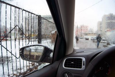 Close-up of car against sky