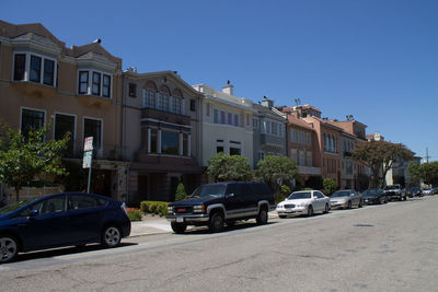 Cars parked in front of building