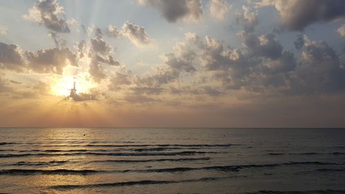 Scenic view of sea against sky during sunset