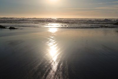 Scenic view of sea against sky during sunset
