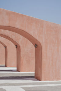 Corridor of building against clear sky