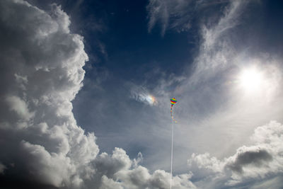 Low angle view of kite flying against sky