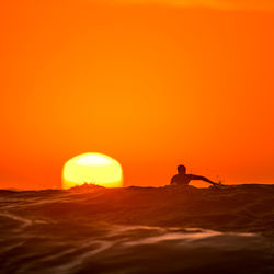 Scenic view of landscape at sunset