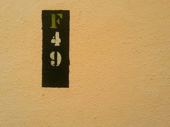 Close-up of numbers on wall
