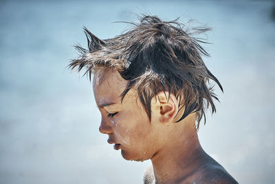 Close-up of boy with tousled hair