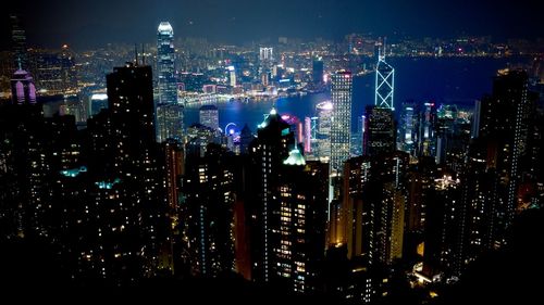 Illuminated cityscape at night