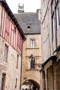 Low angle view of old building in town