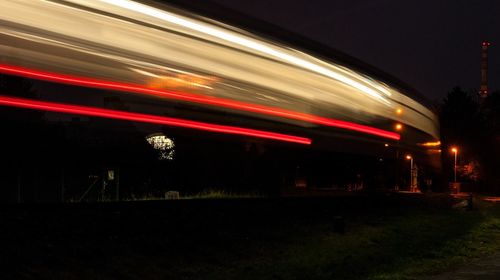 Light trails on train at night