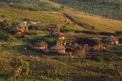 Scenic view of village on a hill