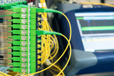 Passive optical network with testing and measuring reflectometer