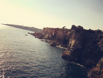 Scenic view of sea against clear sky