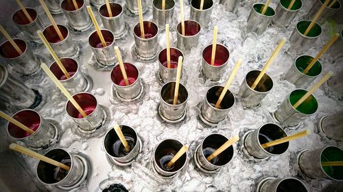 Full frame shot of skewers in containers on ice