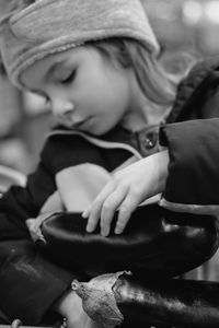 Close-up of girl holding eggplants